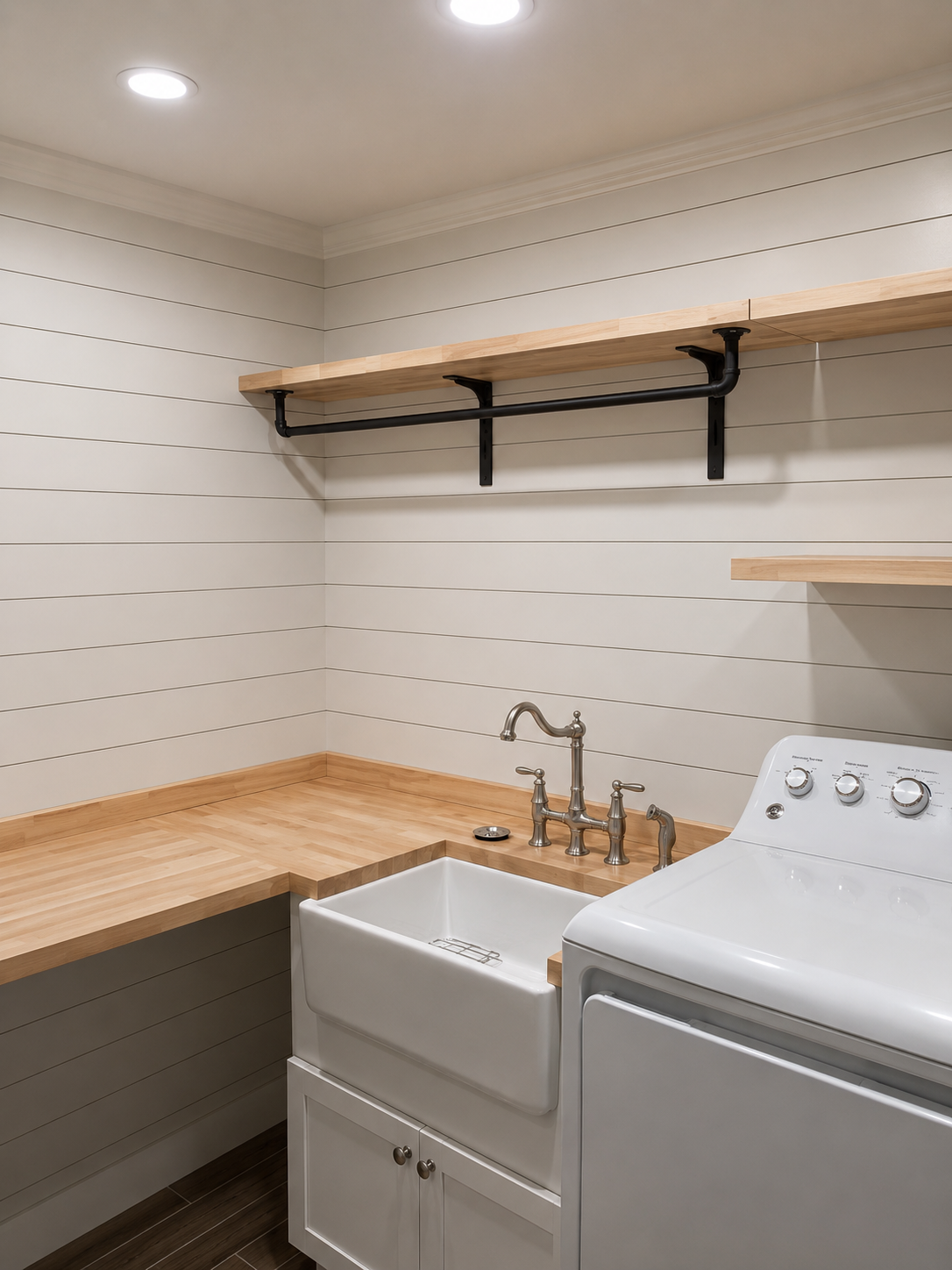 Remodeled laundry room with farmhouse sink, butcher-block counters and shiplap walls
